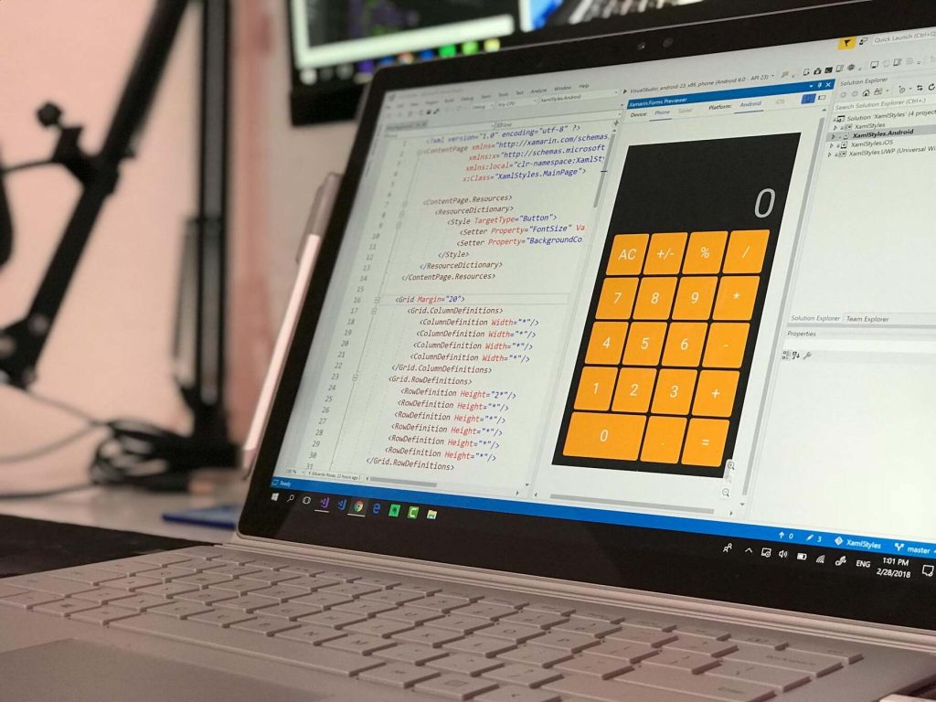 A laptop screen showing the code for an app in development